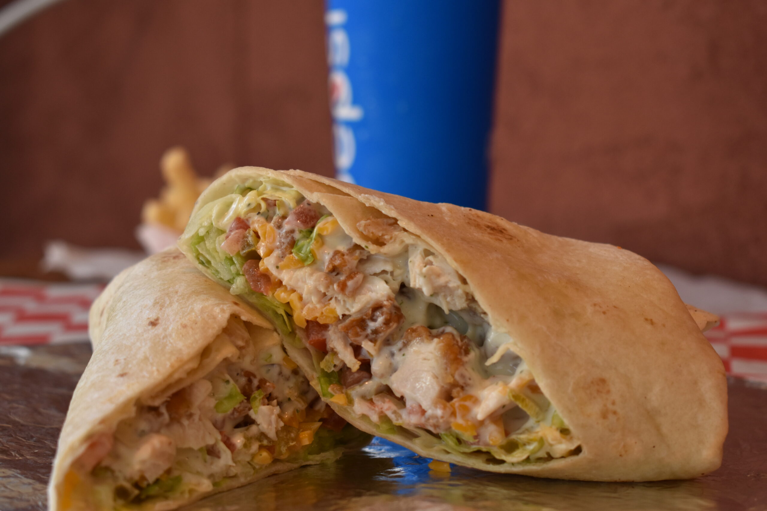 close up of a chicken wrap cross section staright on