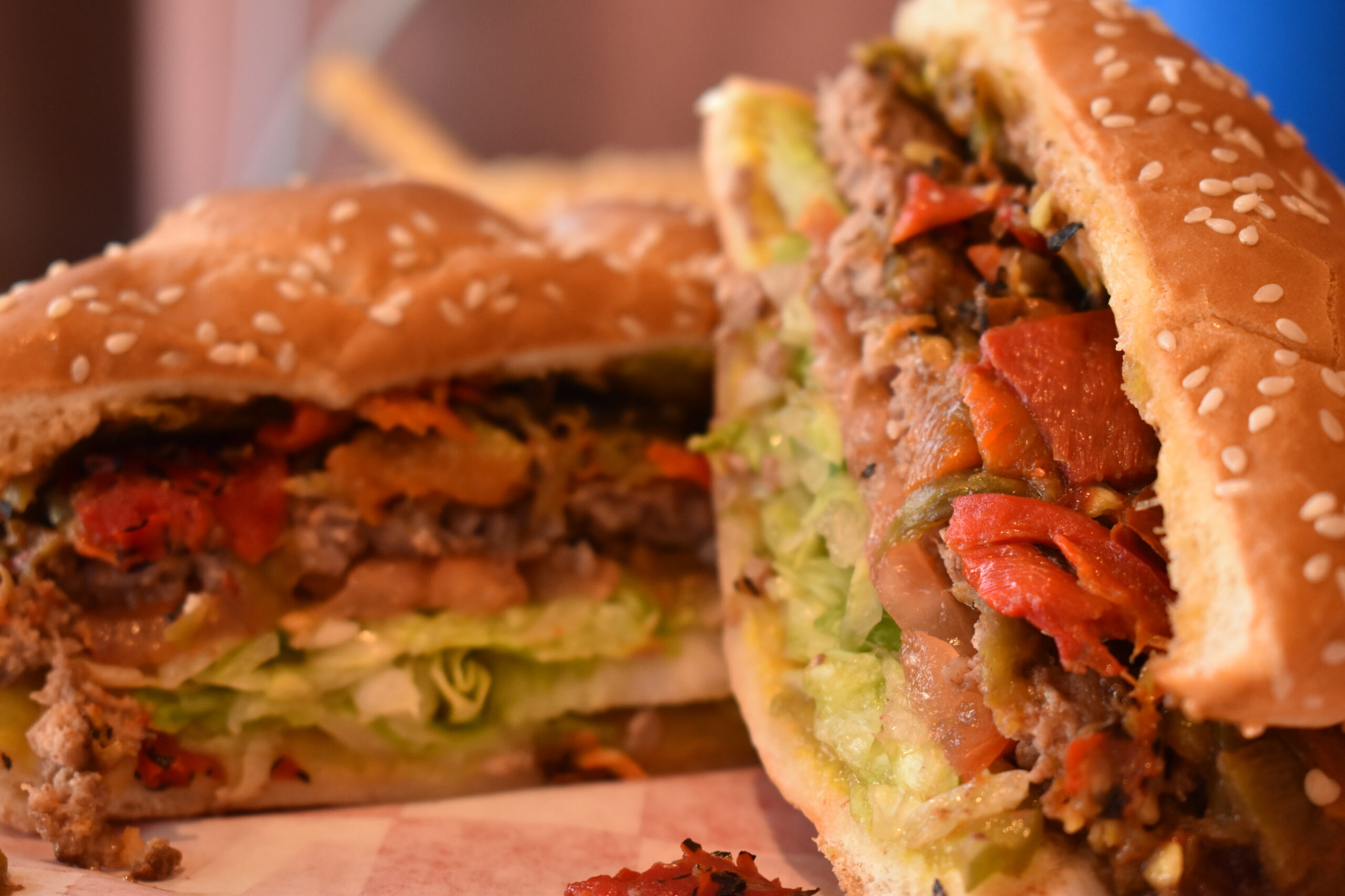 close up cross section of a green chile burger